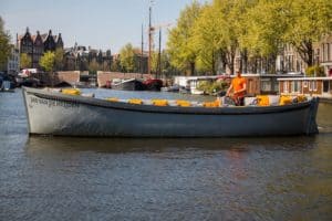 Boot Sloep Jan van der Heijden met schipper kapitein in amsterdam Boot Sloep Jan van der Heijden met schipper kapitein in amsterdam