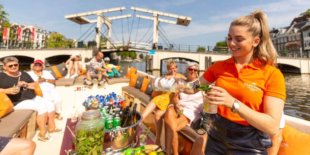 Luxe grachten rondvaart met host Amsterdam