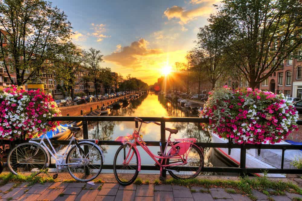 Zonsondergang Amsterdamse grachten Grachten Amsterdam tijdens zonsondergang